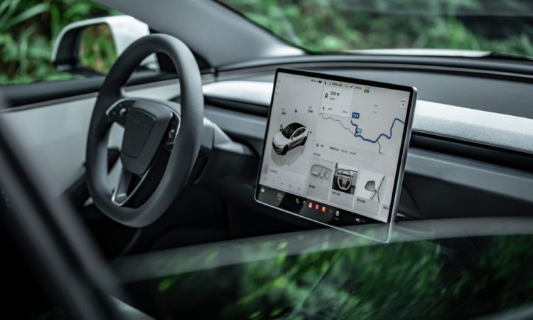 Tesla Influencers Clash Over Controversial Shift in Full Self-Driving Ownership